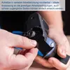 A close-up of hands holding a black and blue power tool. Náhled obrázku produktu