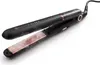 A black and rose gold hair straightener with steam coming from the plates, set against a white background. Náhľad obrázku produktu