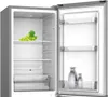 An open refrigerator with shelves and a bunch of grapes on one shelf. Produktbild-Vorschau