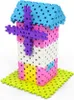 A 3D render of a toy windmill made of building blocks. Podgląd zdjęcia produktu