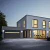 A modern house with a garage and driveway at dusk. Produktbild-Vorschau