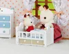 Sylvanian Families Lapin en chocolat Bébé avec lit de bébé, Voir les images du produit 3