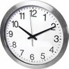 A close-up, straight-on view of a wall clock. Voir les images du produit