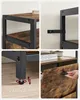 Collage of four close-up shots of a wooden and black metal furniture piece, likely a shoe cabinet or shelving unit, showing construction details and features. Produktbild-Vorschau