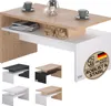 A modern coffee table with storage, shown with decorative items and a set of smaller table samples in different colors. Produktbild-Vorschau
