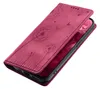 A magenta phone case with a dandelion design, shown open to reveal a phone screen. Produktbild-Vorschau