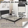 A bedroom scene with a bed frame and assembly instructions. Náhled obrázku produktu