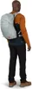 A person wearing a backpack. Produktbild-Vorschau
