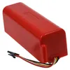 A red battery pack with wires attached. Produktbild-Vorschau