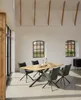 A dining room scene with a table and chairs. Produktbild-Vorschau