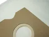 A close-up view of a vacuum cleaner bag, showing the cardboard attachment with a circular opening and the white fabric of the bag. Produktbild-Vorschau