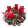 A Christmas advent wreath with four red candles, pinecones, and greenery. Produktbild-Vorschau