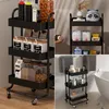 Collage of a black rolling cart in different settings: kitchen, bathroom, and a decorative shelf. Produktbild-Vorschau