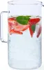A clear glass pitcher filled with water, sliced strawberries, and mint leaves. Produktbild-Vorschau