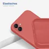 A close-up view of a red silicone phone case, showing the camera cutout and the interior texture. The case is partially covering a phone. Produktbild-Vorschau