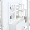 A close-up view of a white wooden house-shaped bed frame, showing an open window with shutters and a storage compartment below. Náhled obrázku produktu