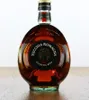 A bottle of Vecchia Romagna brandy on a wooden surface against a white background. Anteprima dell’immagine prodotto