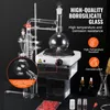 A laboratory distillation setup is displayed against a black background, with text overlays highlighting product features. Produktbild-Vorschau