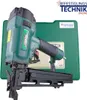 A green pneumatic nail gun and its green carrying case are displayed against a white background. Produktbild-Vorschau