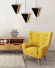 A modern living room with a yellow armchair, a wooden cabinet, and three triangular pendant lights. Produktbild-Vorschau