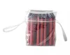 A group of red cylindrical objects are bundled together in a clear plastic bag with white drawstrings. Anteprima dell’immagine prodotto