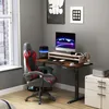 A home office setup with a computer desk, chair, and accessories. Voir les images du produit