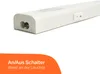 A close-up view of a white LED under-cabinet light fixture, showing the power input and an on/off switch. Text overlay describes the switch. Produktbild-Vorschau
