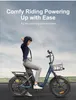 A woman is riding an electric bicycle outdoors. Produktbild-Vorschau