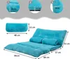 Diagrams showing dimensions of a blue floor sofa. Voir les images du produit