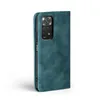 A teal-colored flip case for a smartphone is shown against a white background. Produktbild-Vorschau