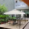 An outdoor patio scene with a gazebo and table and chairs. Produktbild-Vorschau