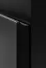 A close-up shot of a black cabinet handle and drawer front. Produktbild-Vorschau
