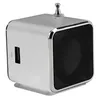 A silver cube-shaped mini-speaker with a black speaker grille and a USB port on the side. Produktbild-Vorschau