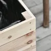 Close-up of a wooden raised garden bed with black liner. Produktbild-Vorschau