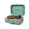 A vintage-style record player in an open suitcase design. Voir les images du produit