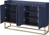 A navy blue sideboard with gold legs, shown with its doors open to reveal shelves. Náhled obrázku produktu