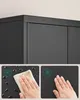 Close-up of a black cabinet with inset panels, showcasing its water and fingerprint resistant properties. Náhled obrázku produktu