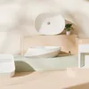 A minimalist display of bathroom sinks on tiered platforms with soft lighting and shadows. Anteprima dell’immagine prodotto