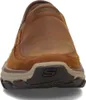 A close-up, front-facing view of a brown leather slip-on shoe. Voir les images du produit