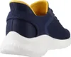 A close-up side view of a navy blue sneaker with a white sole and yellow trim. Voir les images du produit