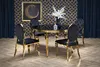 A dining set with a round glass table and four chairs in a luxurious room setting. Podgląd zdjęcia produktu