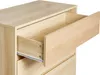 A close-up view of a light-colored wooden dresser with one drawer partially open. Podgląd zdjęcia produktu