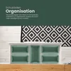 A drawer organizer with multiple green bins is shown, with a patterned rug in the background. Produktbild-Vorschau