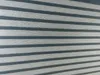 A close-up view of a striped roller blind. Produktbild-Vorschau