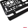 A close-up, angled view of a black license plate holder and a detachable trim piece against a white background. Podgląd zdjęcia produktu
