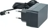 A black power adapter with a coiled black cord and a circular connector. Produktbild-Vorschau