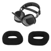 A pair of headphones and two replacement ear pads are shown against a white background. Podgląd zdjęcia produktu