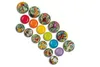 A collection of round plates with tropical fruit and bird designs, arranged diagonally on a white background. Anteprima dell’immagine prodotto