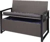 A poly-rattan garden bench with a storage compartment and grey cushions. Podgląd zdjęcia produktu