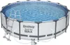 A round above-ground swimming pool filled with water, with a ladder and a pump visible. Produktbild-Vorschau